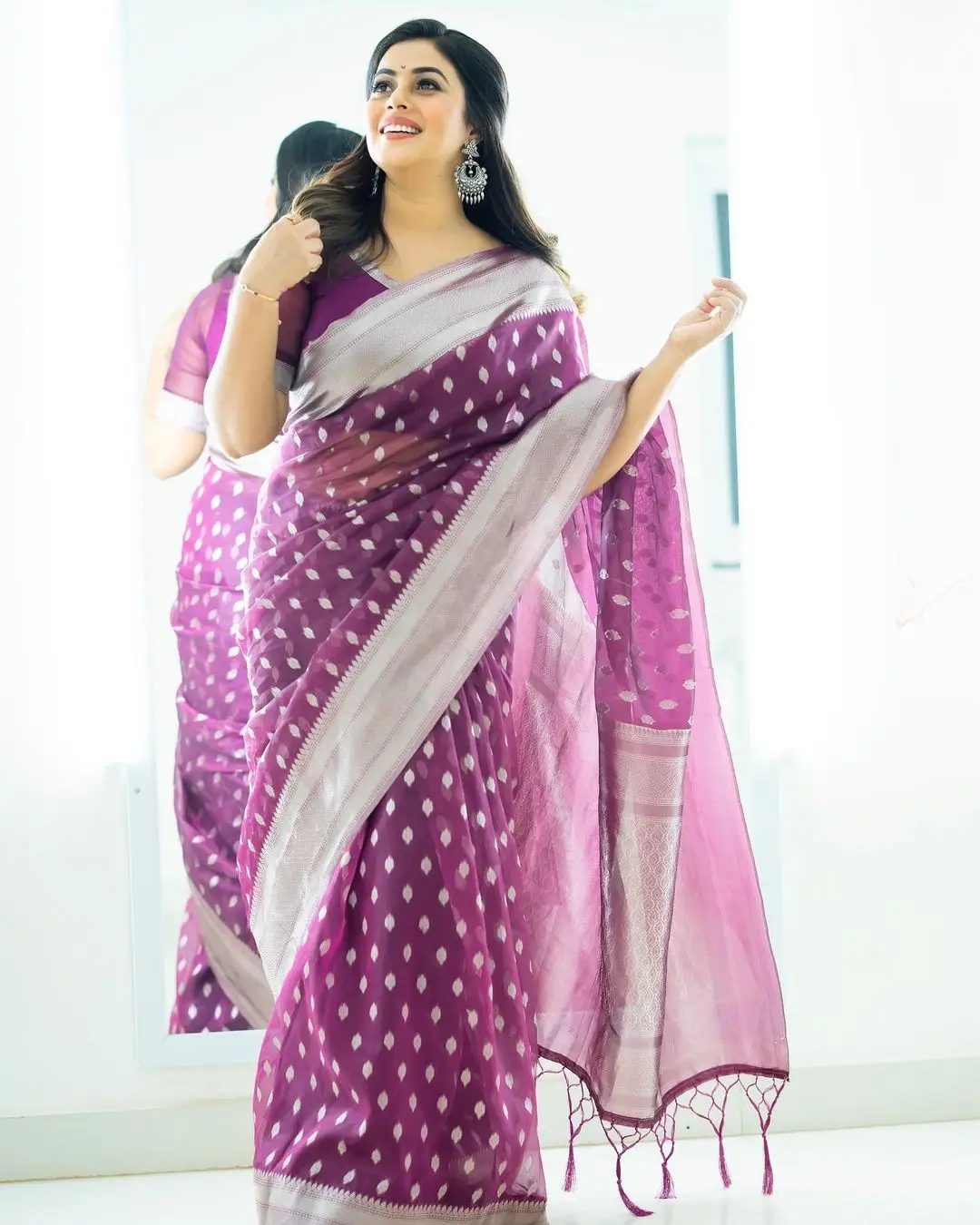 Shamna Kasim Wearing Beautiful Earrings Violet Designer Saree